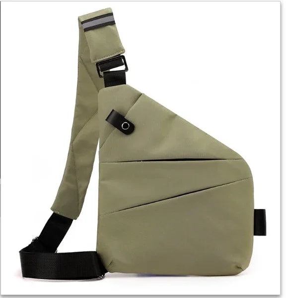 Olive green triangular sling backpack with black adjustable strap and minimalist design