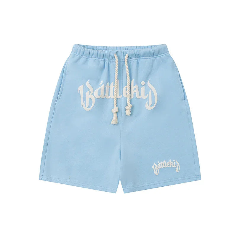 Light blue Battlekid shorts with drawstring waist and front logo, casual streetwear