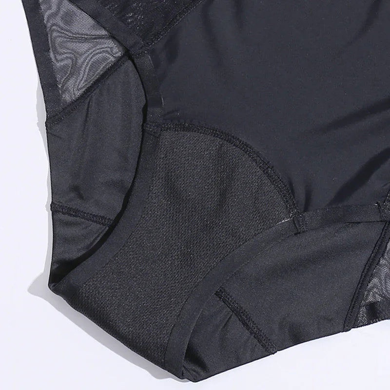 Close-up of black women's underwear with mesh and padded fabric detailing