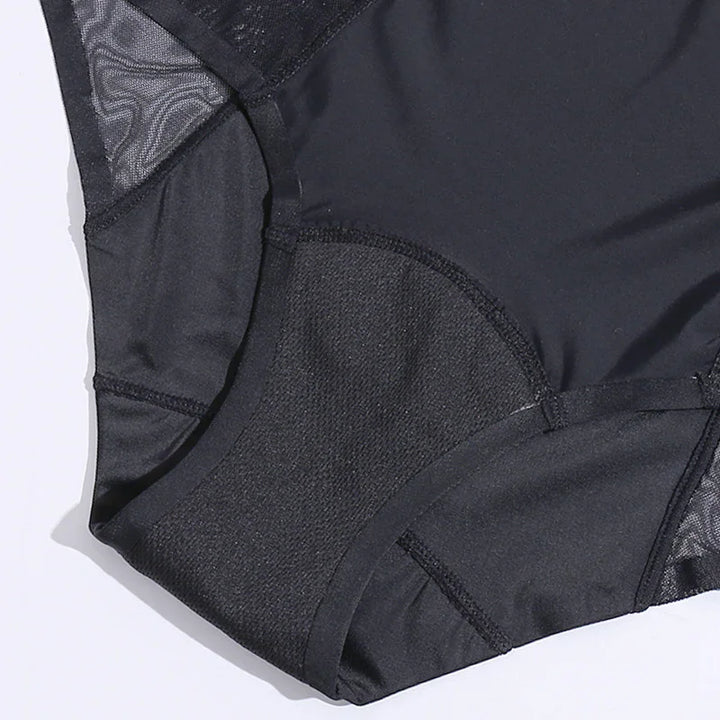 Close-up of black women's underwear with mesh and padded fabric detailing