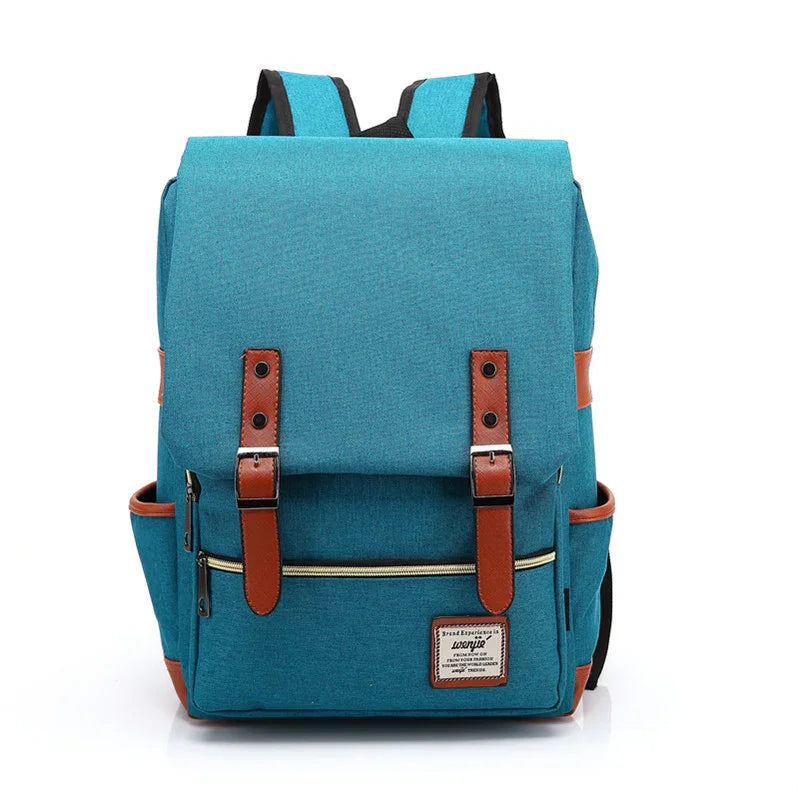 Blue canvas backpack with brown leather straps, front zipper pocket, and side pockets