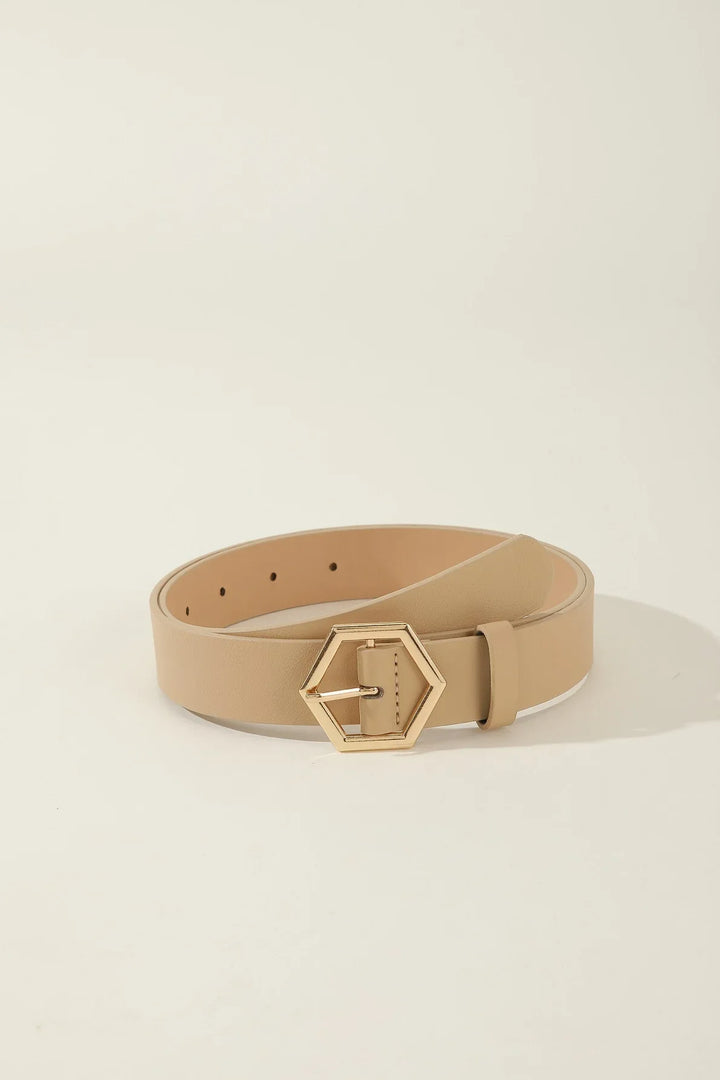 Beige leather belt with gold hexagonal buckle on light background