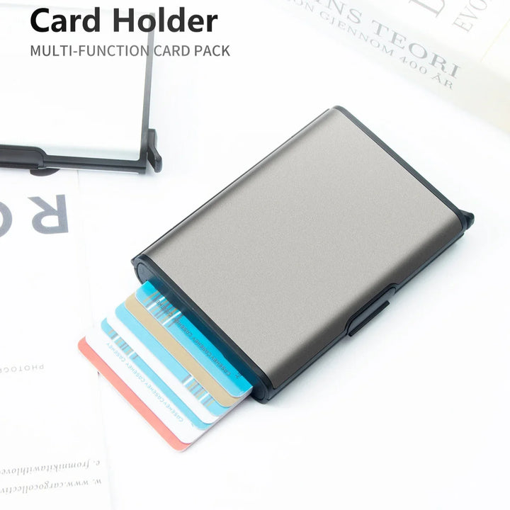 Modern metal card holder with multiple credit cards partially pulled out for easy access