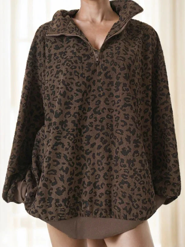 Brown leopard print quarter zip pullover sweater with ribbed texture and loose fit