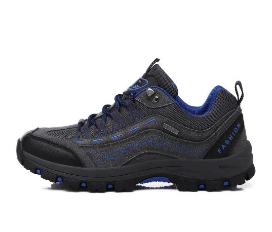 Black and blue waterproof hiking shoe with rugged sole and lace-up design