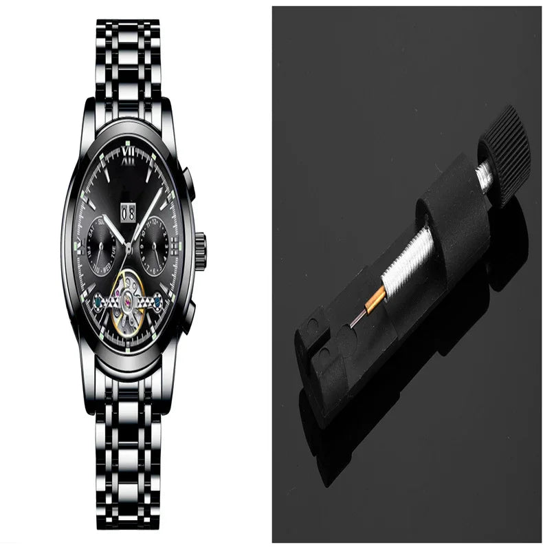Luxury stainless steel black dial wristwatch with chronograph and mechanical parts on black background