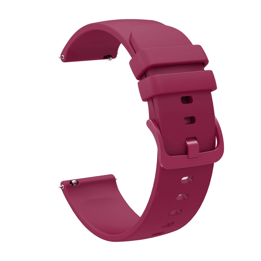 Maroon silicone watch band with buckle and adjustable holes isolated on white