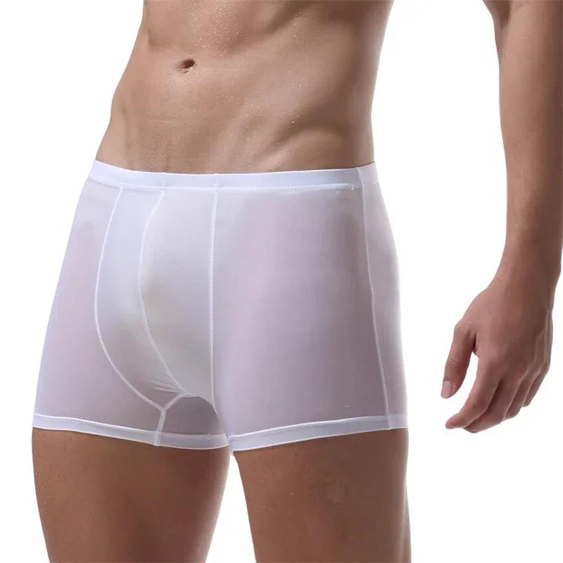male model wearing white sheer boxer briefs fitness underwear on white background