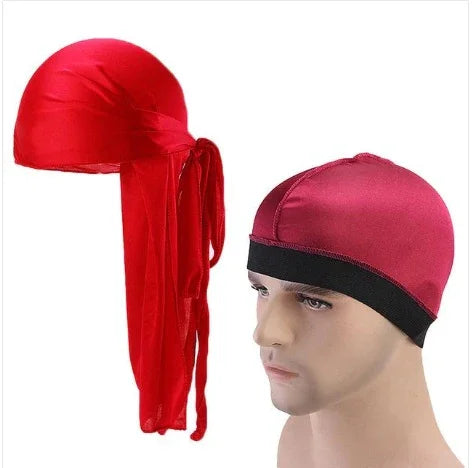 Red satin durag with long tail and red and black satin wave cap on mannequin head