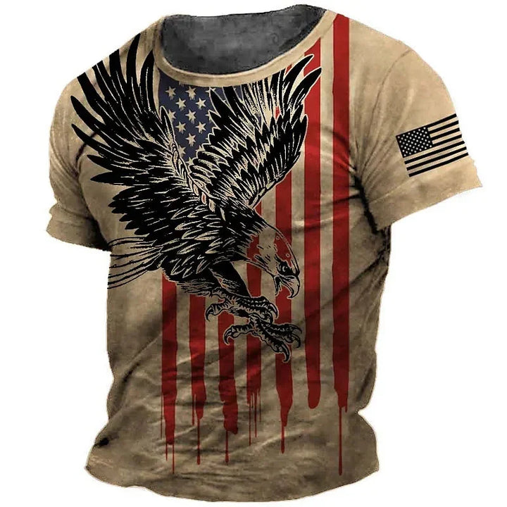 Tan T-shirt featuring dripping American flag design with a large black eagle graphic and a smaller flag on the sleeve