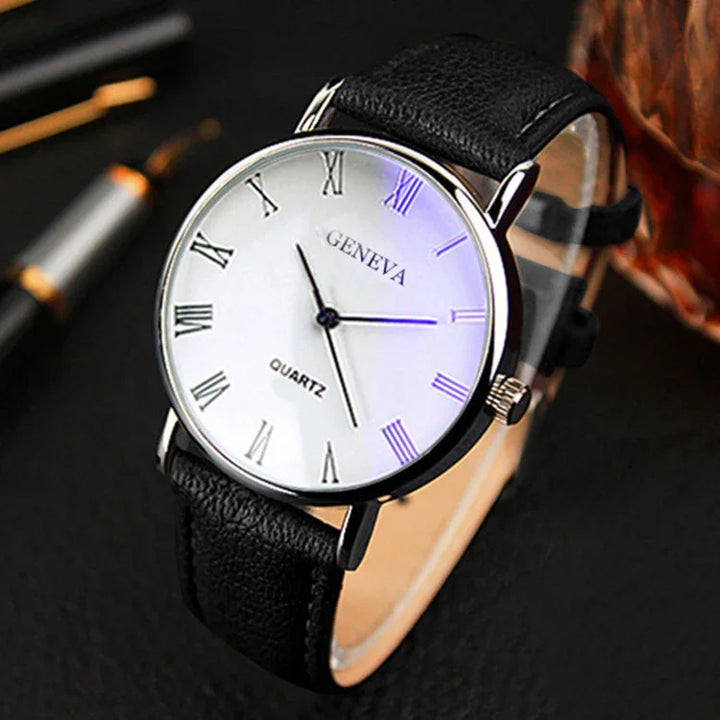 Classic Geneva quartz wristwatch with white dial, black Roman numerals, and black leather strap
