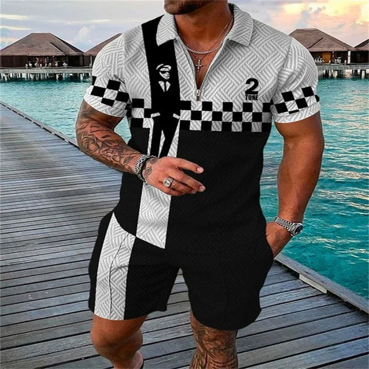 Stylish man wearing black and white 2 Tone patterned shirt and shorts on wooden pier by turquoise water