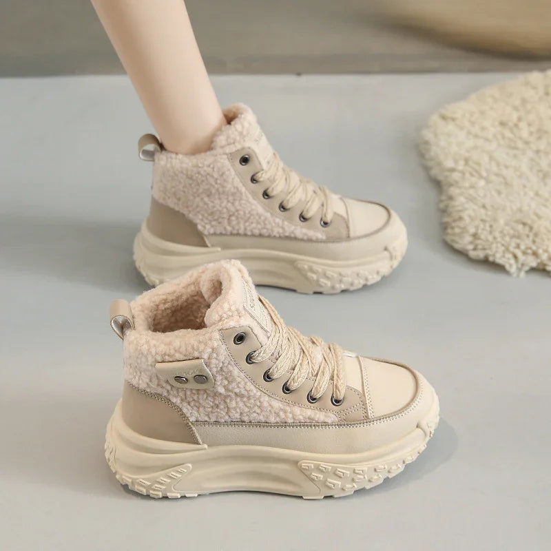 Beige women's high-top platform sneakers with plush shearling lining and chunky soles