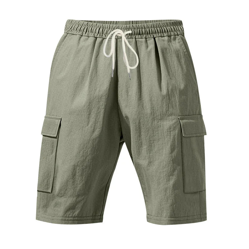 Olive green men's cargo shorts with elastic waistband and white drawstring