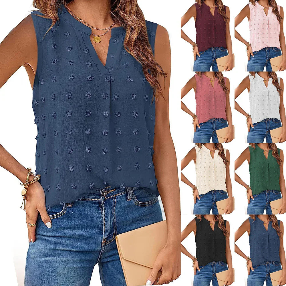 Woman wearing sleeveless textured blouse in multiple colors styled with jeans and a beige clutch
