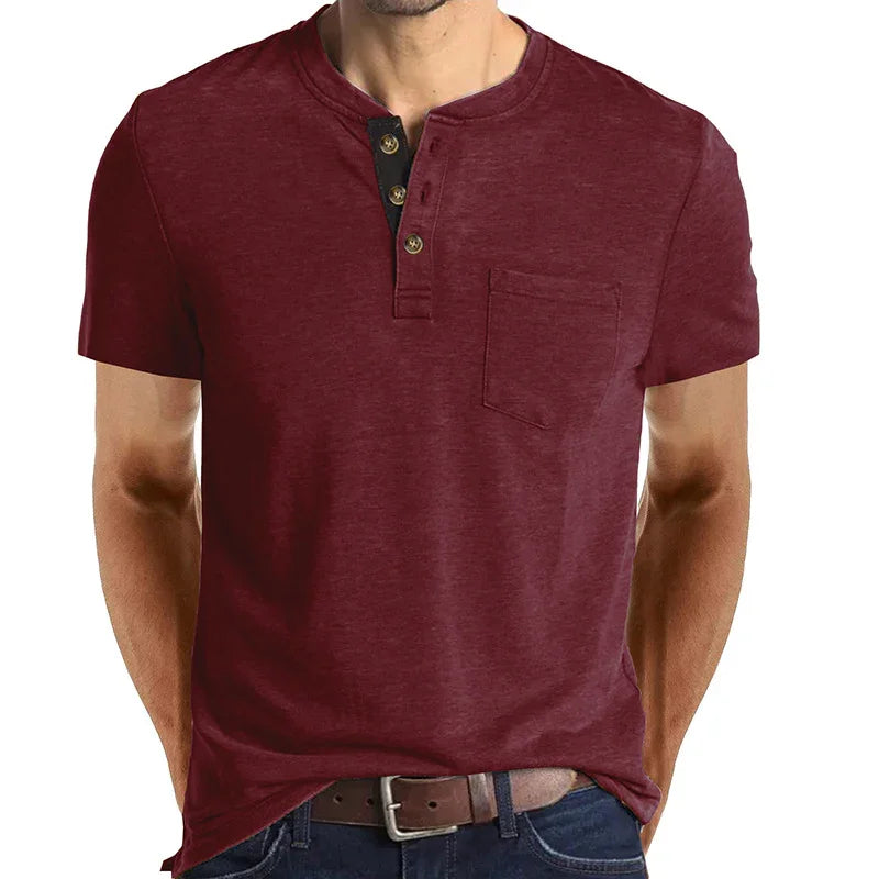 Men's burgundy henley T-shirt with short sleeves, front pocket, and button detail