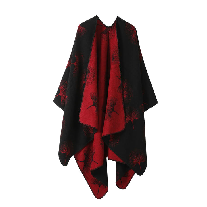 Reversible black and red shawl with leaf patterns and stitched edges on white background
