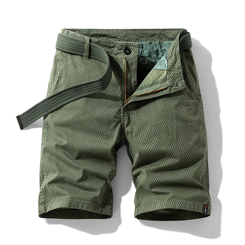 Men's green textured casual shorts with zipper fly and matching belt on white background