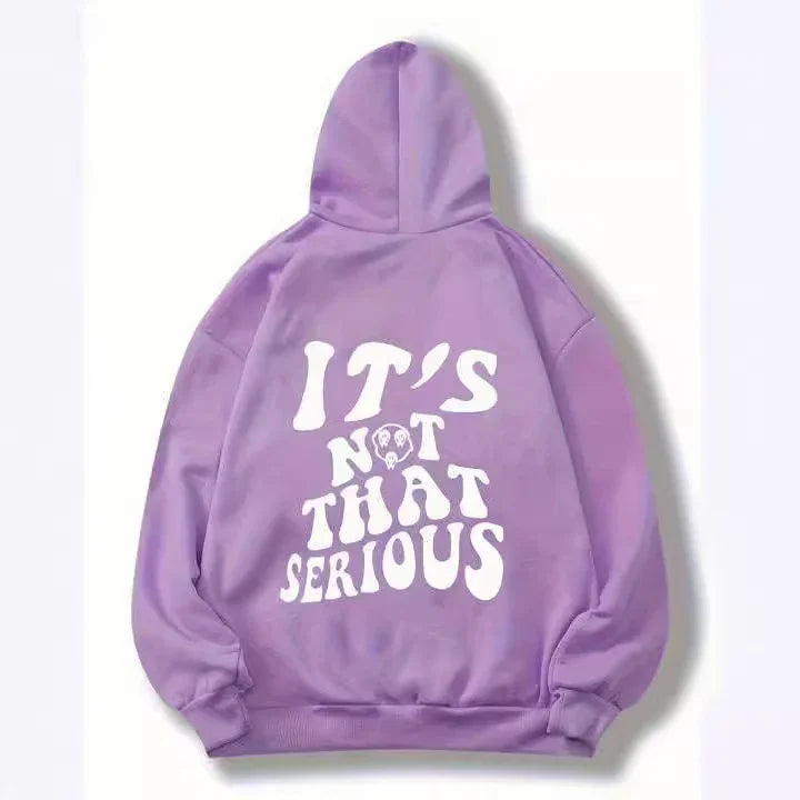 Purple hoodie with white text saying "IT'S NOT THAT SERIOUS" and small ghost graphic on back