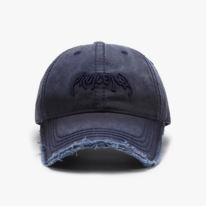 Dark blue distressed baseball cap with curved brim and embroidered text on front