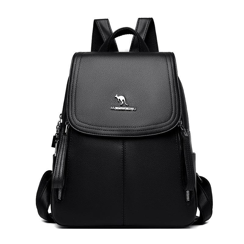 Black leather backpack with kangaroo logo and front flap, zippered side compartments, adjustable straps
