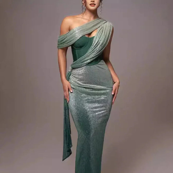 woman wearing elegant one-shoulder green velvet evening gown with draped sash