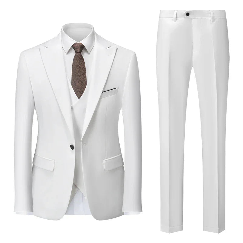 White men's formal suit set with blazer, vest, white shirt, brown patterned tie, and slim-fit trousers