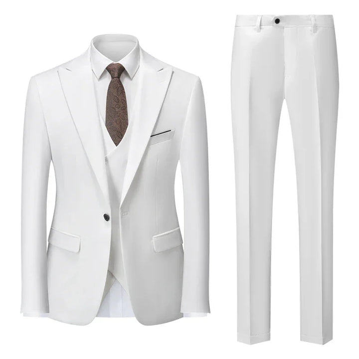White men's formal suit set with blazer, vest, white shirt, brown patterned tie, and slim-fit trousers
