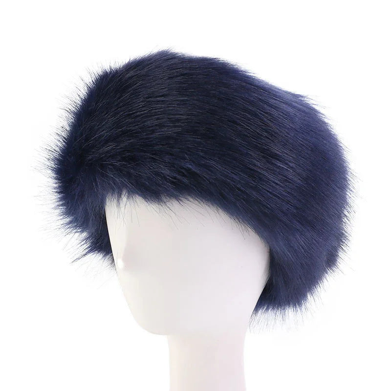 Luxurious dark blue faux fur hat displayed on white mannequin head