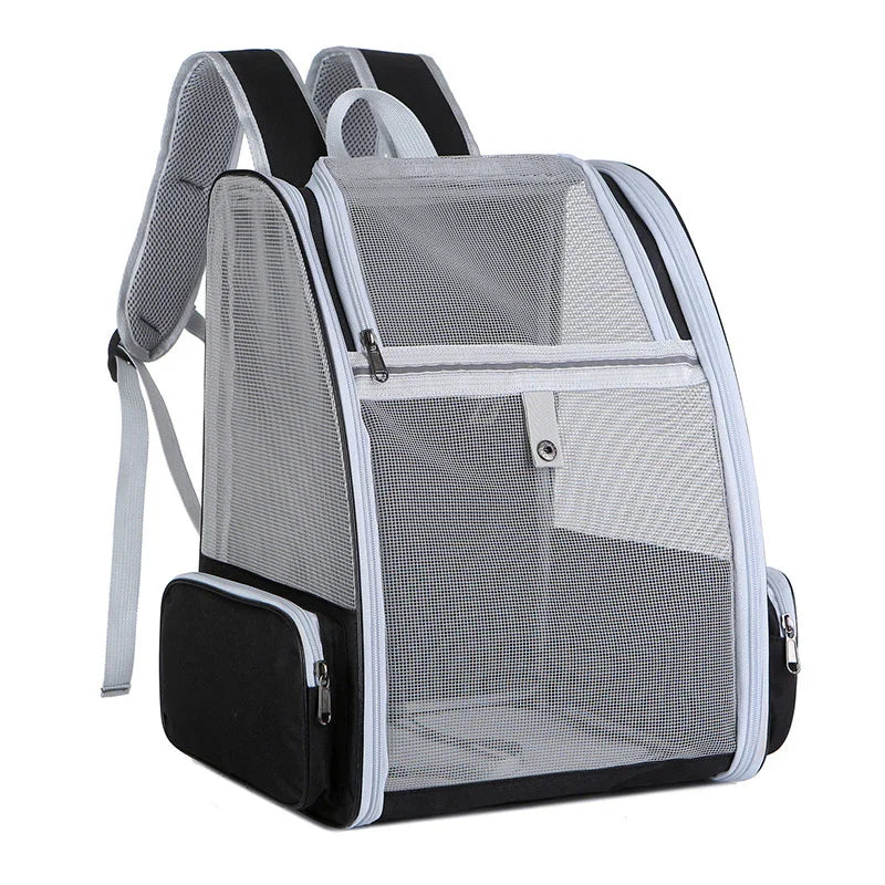 White and black ventilated pet carrier backpack with mesh panels, zippered pockets, and padded shoulder straps