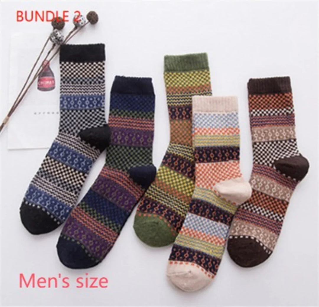 Bundle of five men's size colorful patterned knit socks with geometric designs on white background