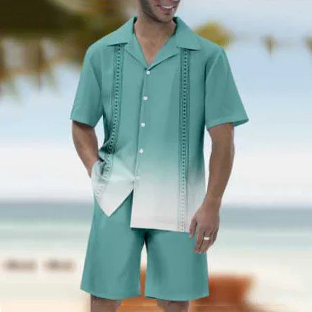 man wearing teal and white ombre short-sleeve button-up shirt and matching shorts on beach