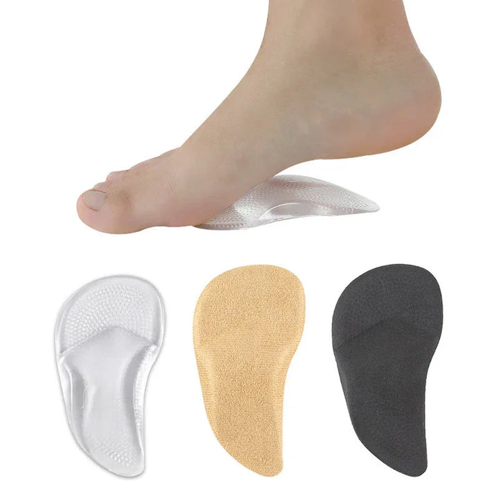 Foot resting on a clear gel heel pad with additional beige and black heel cushion inserts below