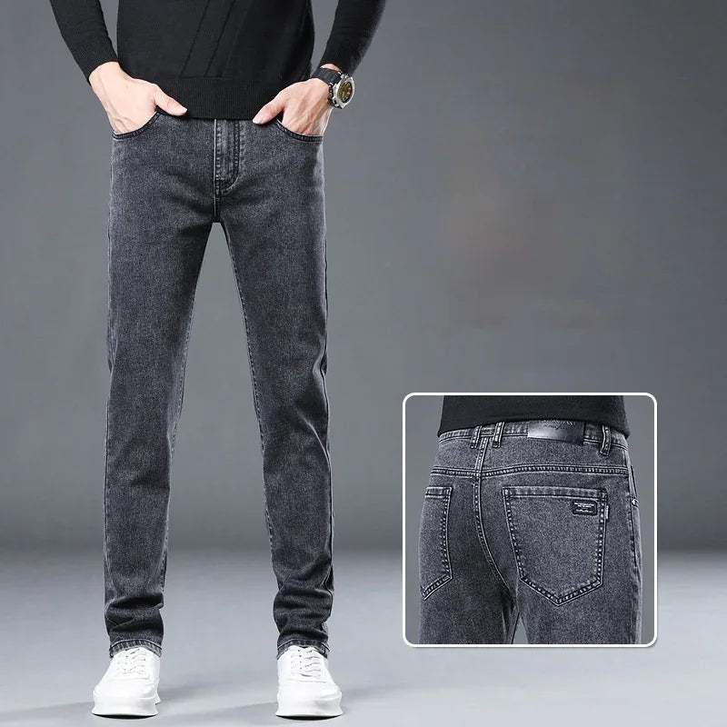 front and back views of men's slim fit black washed denim jeans with white sneakers