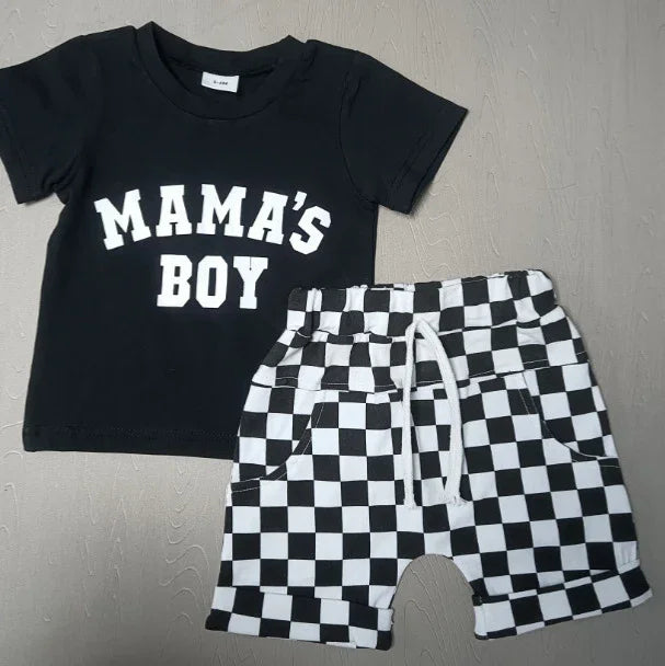 Black toddler T-shirt with white text Mama's Boy and black-and-white checkered shorts
