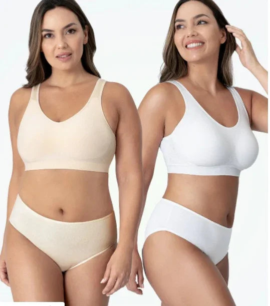 Two women modeling seamless beige and white underwear sets against white background