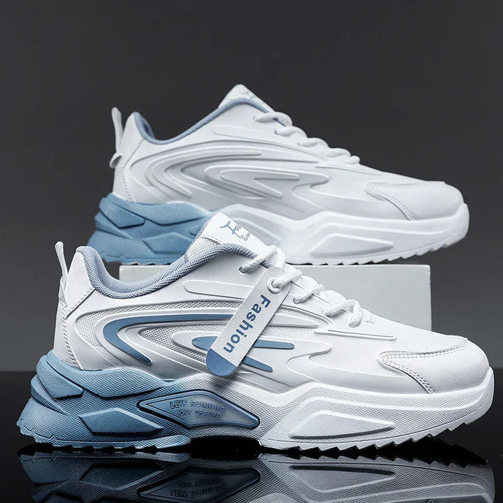 White and blue fashion running sneakers with thick soles and wave design on a dark background