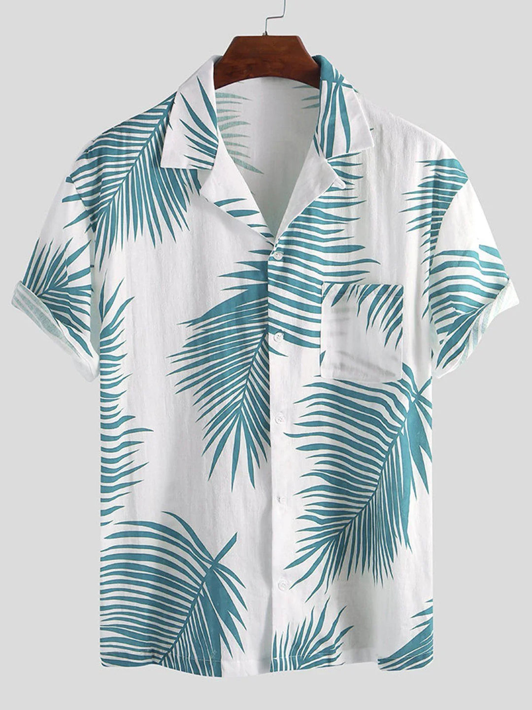 White short-sleeve button-up shirt with rolled cuffs and blue tropical leaf print