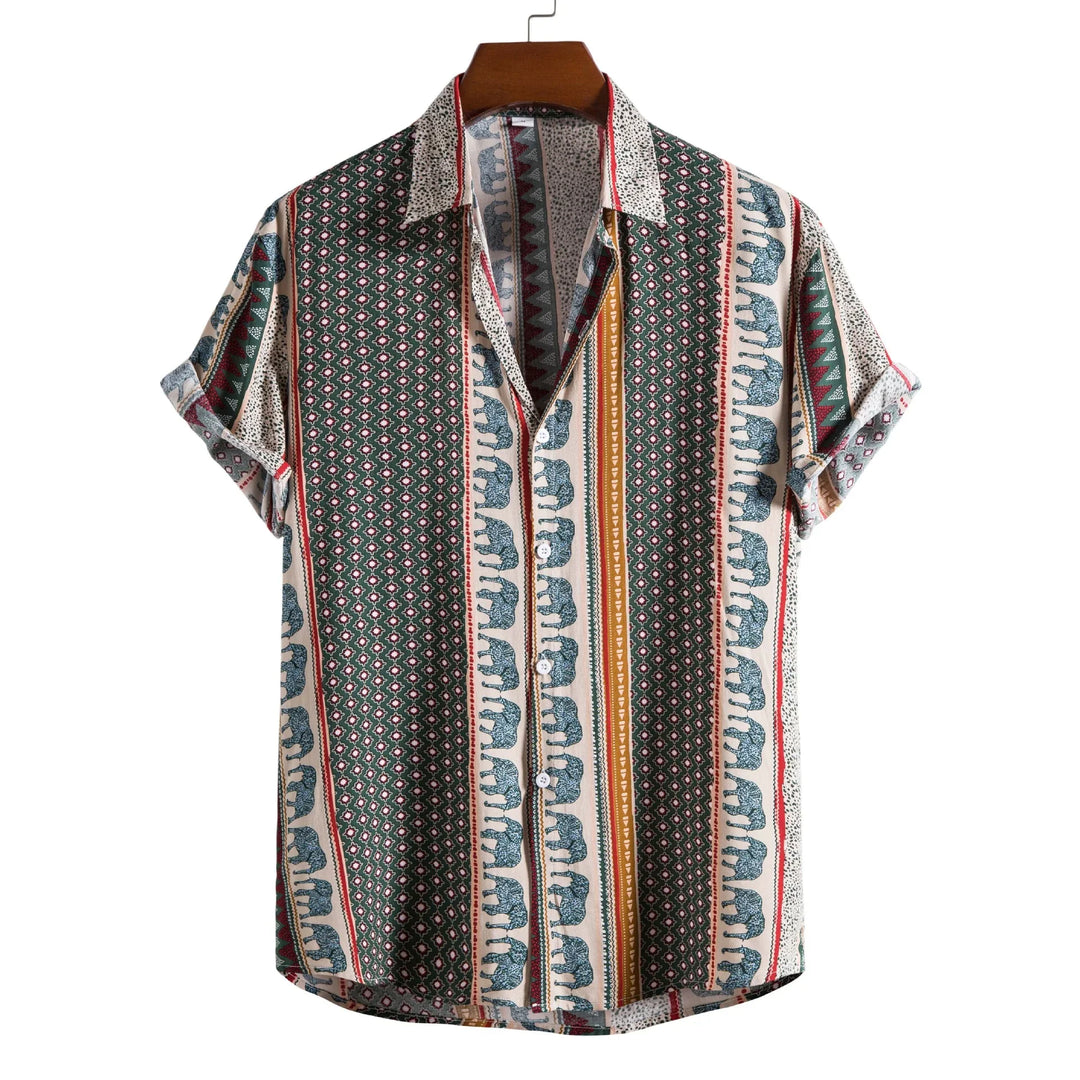 Short-sleeve button-up shirt with green, beige, and gold vertical stripes featuring elephant and geometric patterns