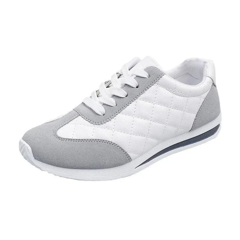 White and gray casual sneaker with quilted side panels and white laces