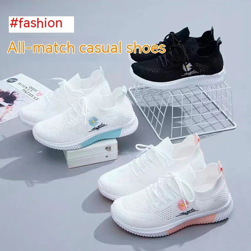 Fashion all-match casual knit sneakers in white and black with colorful floral embroidery on soles