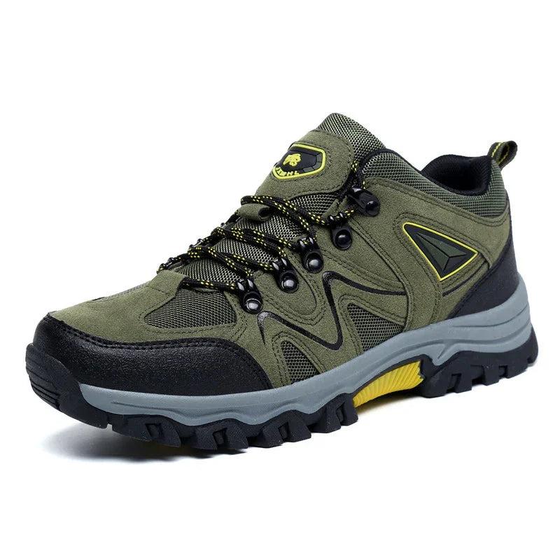 Green and black hiking shoe with yellow accents and rugged sole for outdoor trekking