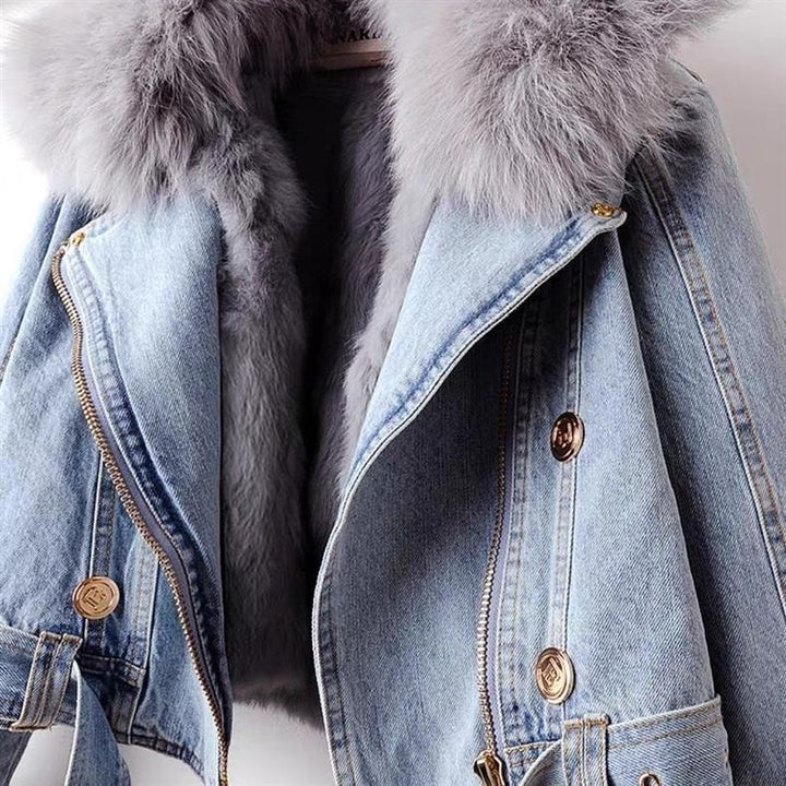 Light blue denim jacket with a luxurious grey faux fur collar and gold buttons and zipper