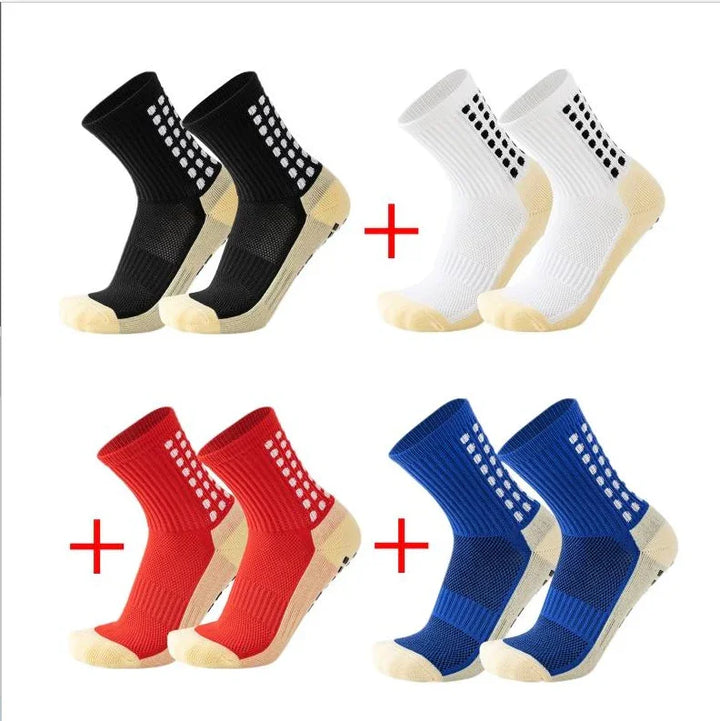 Athletic crew socks in black, white, red, and blue with non-slip grip soles, set of pairs