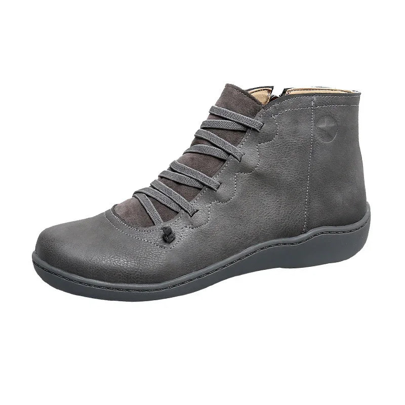 gray leather ankle boot with elastic laces and textured sole, casual comfortable footwear