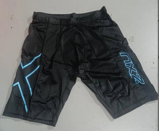 Black 2XU compression shorts with blue logo and graphics on a light surface