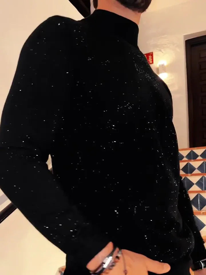 Close-up of a person wearing a black sparkly sweater indoors near tiled stairs