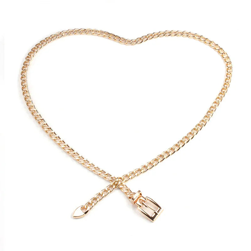 Gold chain belt shaped like a heart on a white background with buckle detail