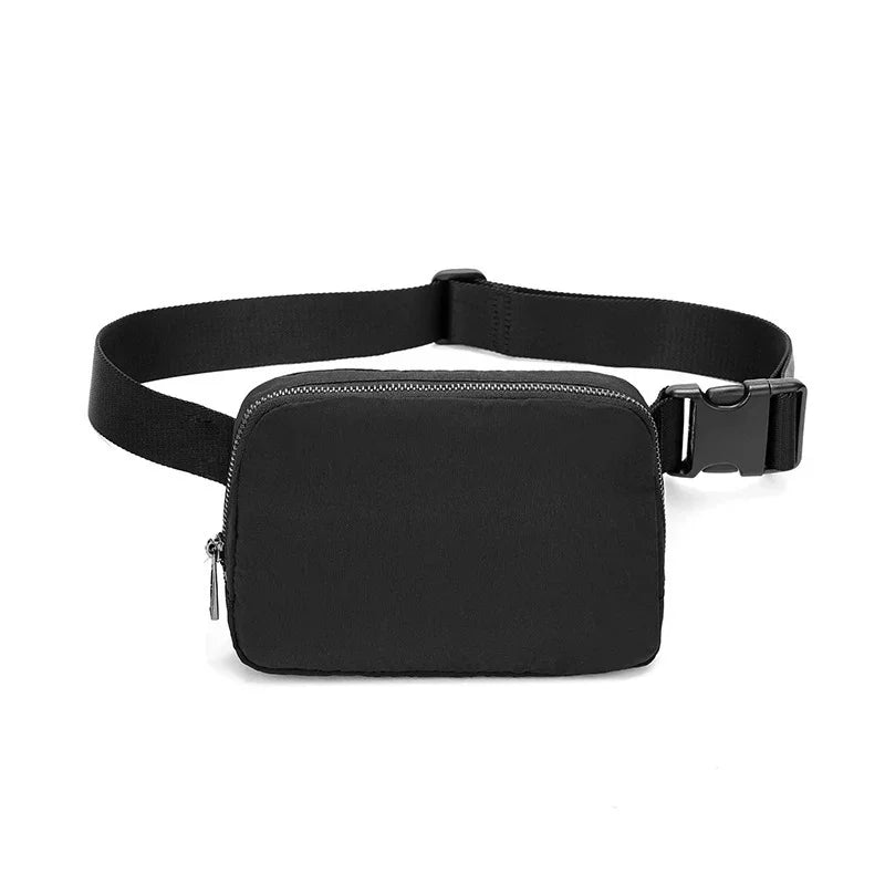 Black rectangular waist bag with adjustable strap and zipper closure on white background