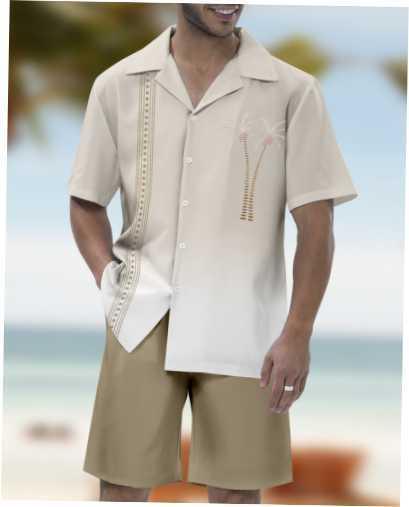 Man wearing beige short-sleeve tropical shirt with palm tree embroidery and khaki shorts at the beach